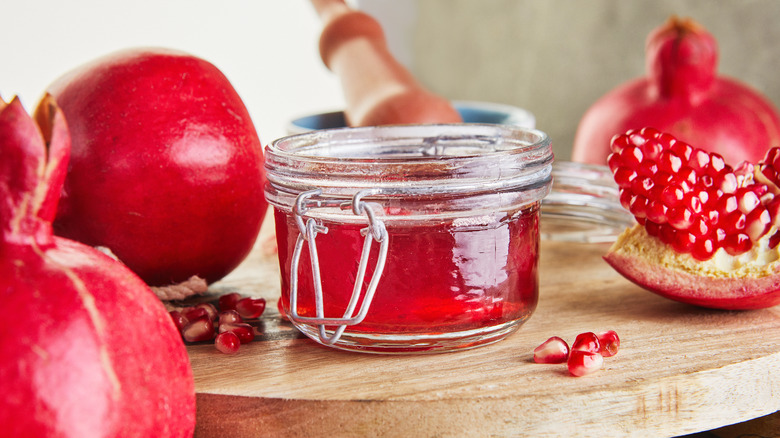 homemade pomegranate syrup in jars