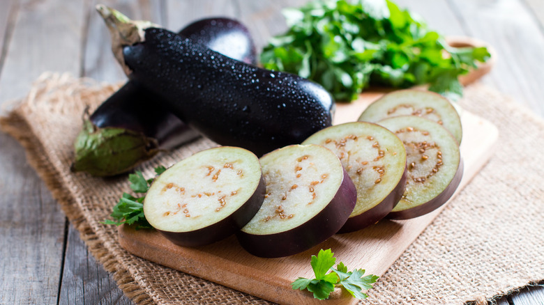 whole eggplant and sliced eggplant