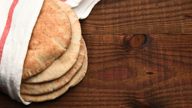 whole wheat pita bread on a table