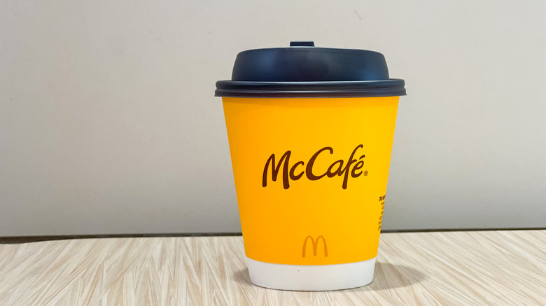 To-go cup of McDonald's caramel hot chocolate