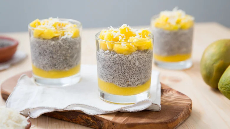 Three cups of mango coconut chia seed pudding