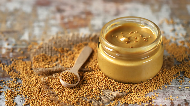 Mustard seeds with jar