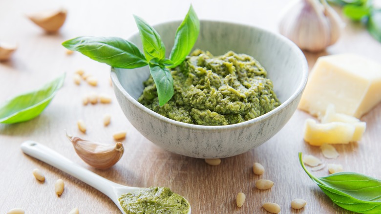 Pesto in bowl with pine nuts