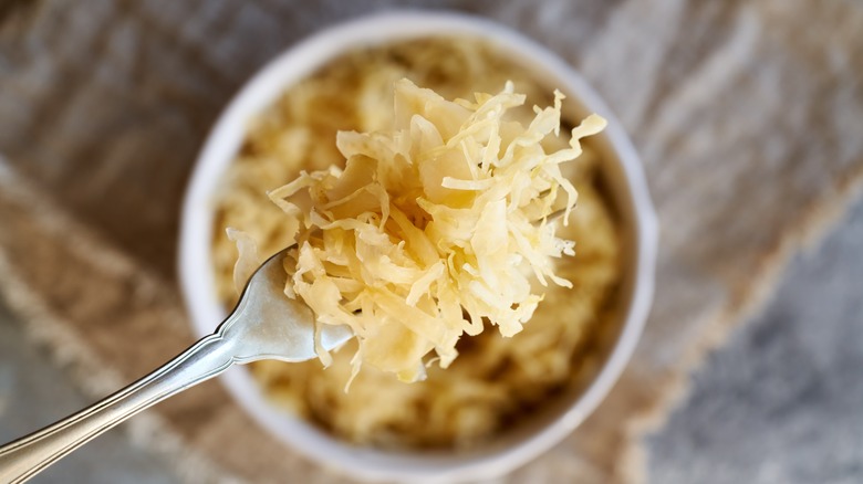 overhead of sauerkraut on fork