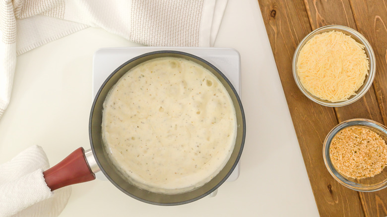 Alfredo sauce in pan