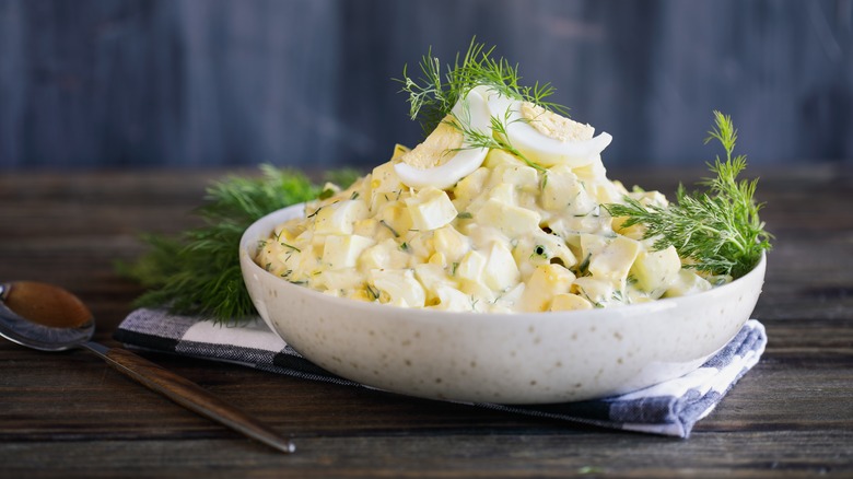 Egg salad with dill garnish