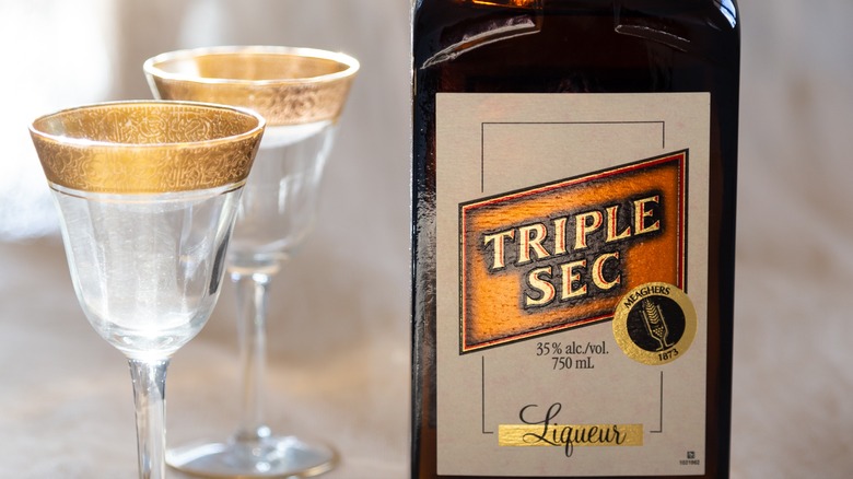Triple sec and two glasses
