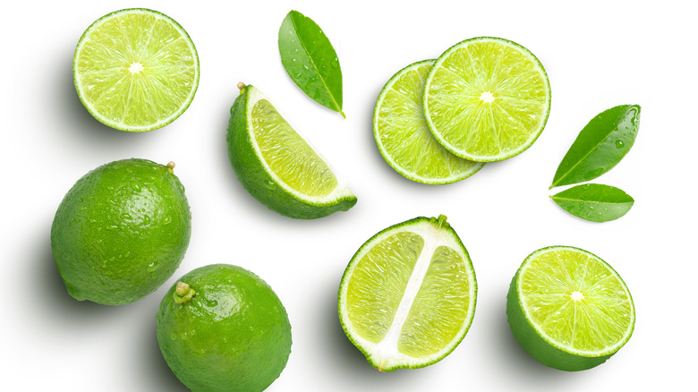 Lime wedges on white background