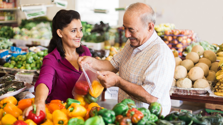 People buying bell peppers