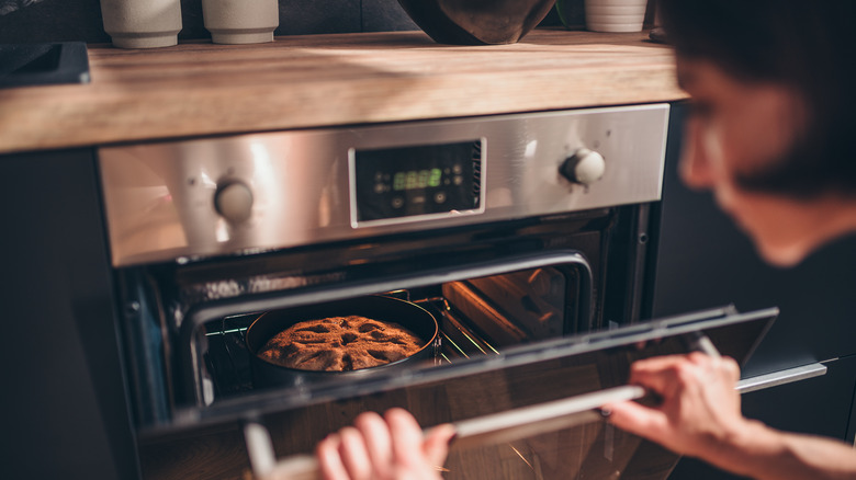 Apple pie baking in oven