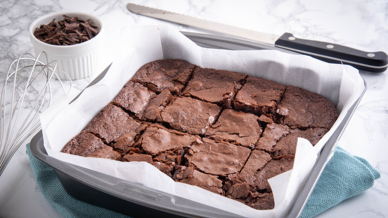 Cut brownies in tray