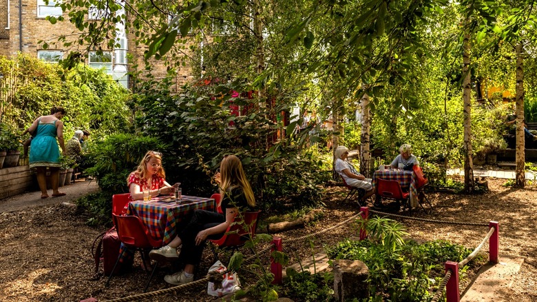 People in Dalston Curve Garden