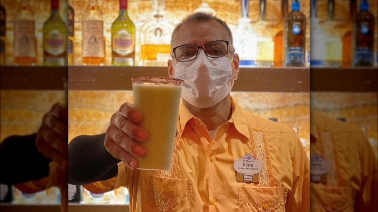 Bartender holding La Cava Avocado cocktail