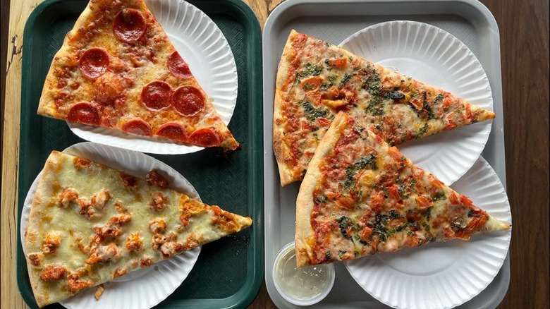 four Olisi's pizza slices