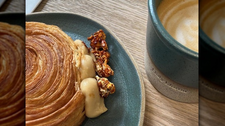 A pastry with coffee