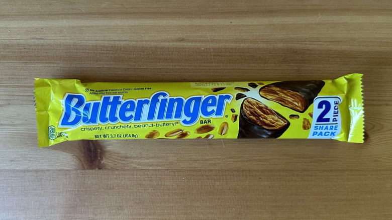 Butterfinger candy bar on wooden table