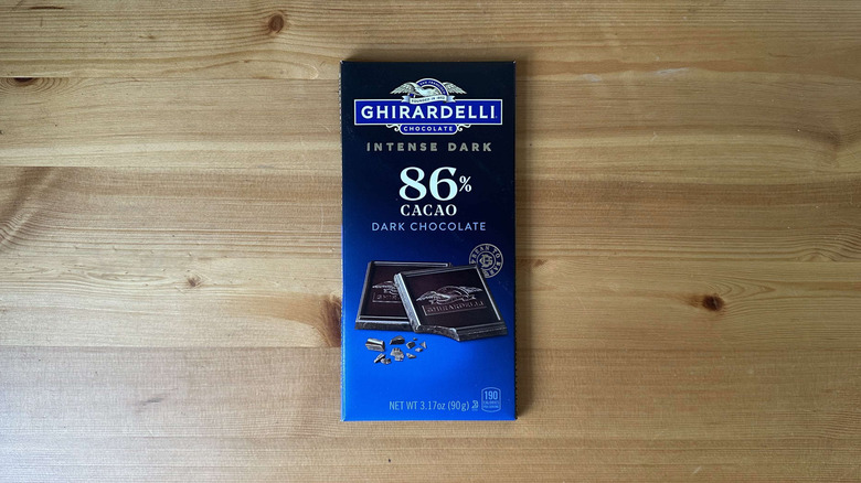 Ghirardelli candy bar on wooden table