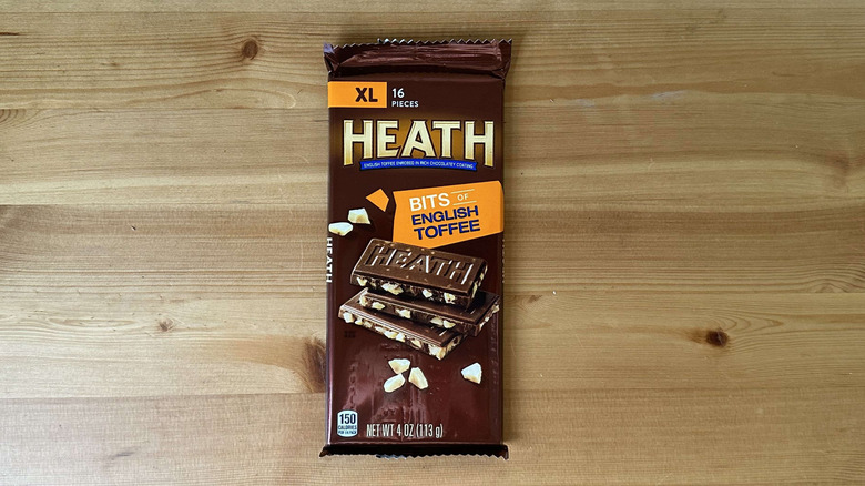 Heath candy bar on wooden table