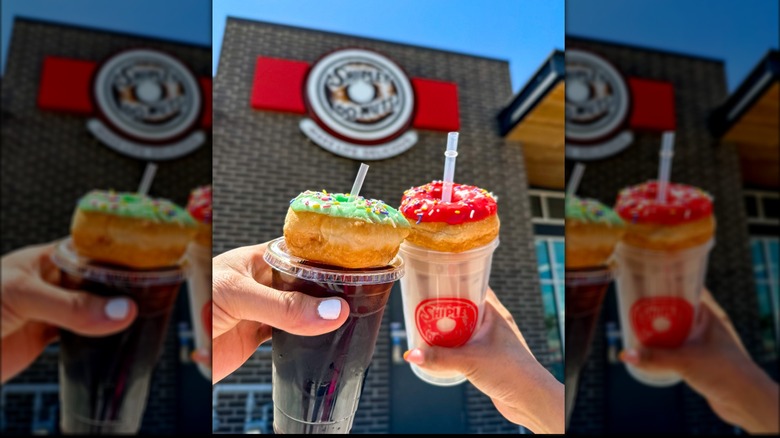 two donuts on cups