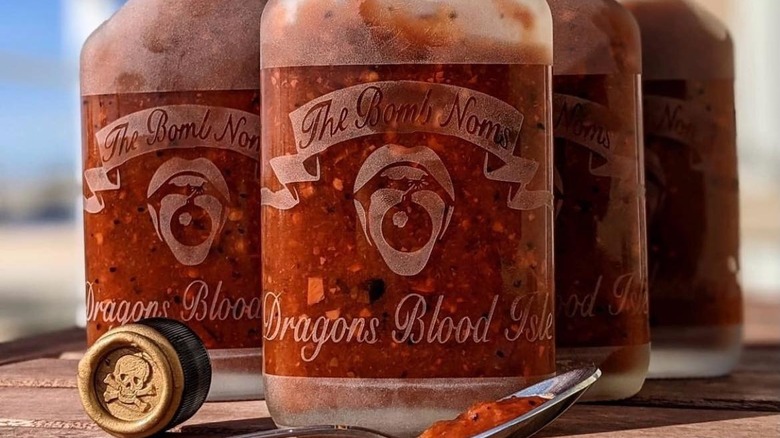 Cloudy red hot sauce bottles