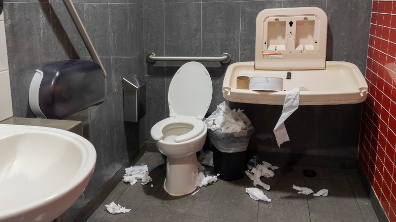 An unkept restaurant bathroom