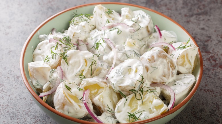 Potato salad in white bowl 