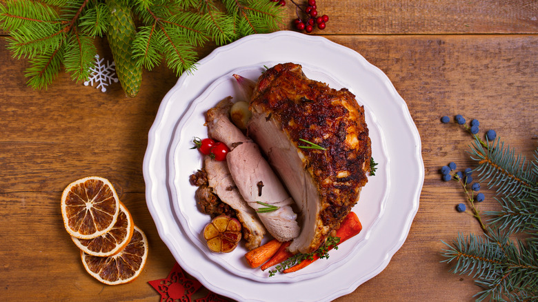 Roasted ham on white plate