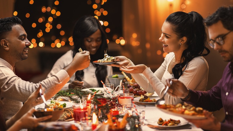 People enjoying holiday dinner