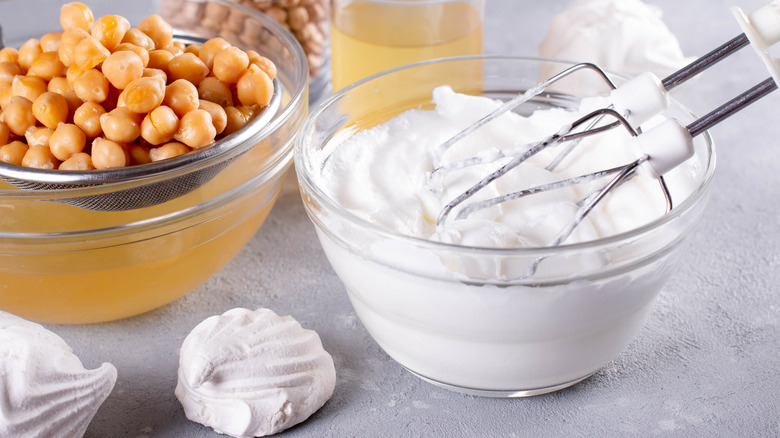 Aquafaba in glass bowl with mixer