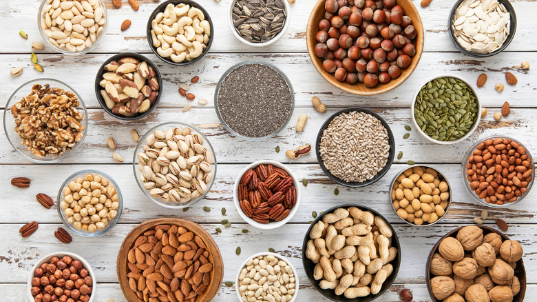 Pecan, brazil nut, walnut, almonds, hazelnuts, pistachios, cashews top view flat lay