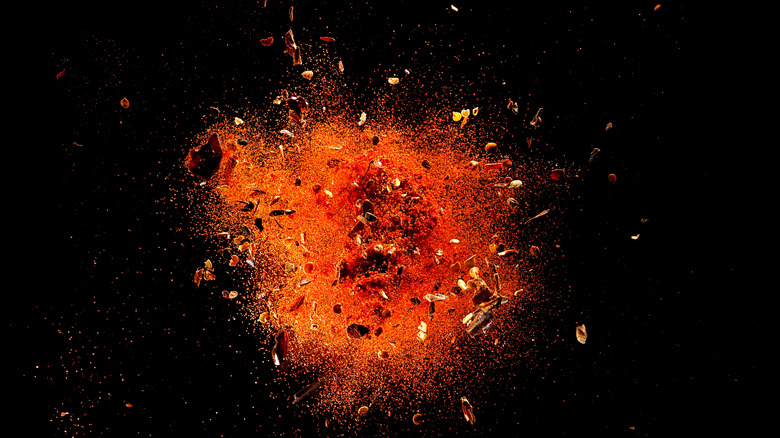 Explosion of red pepper flakes