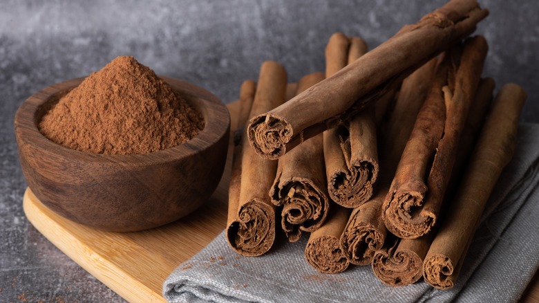 Cinnamon on wooden board 