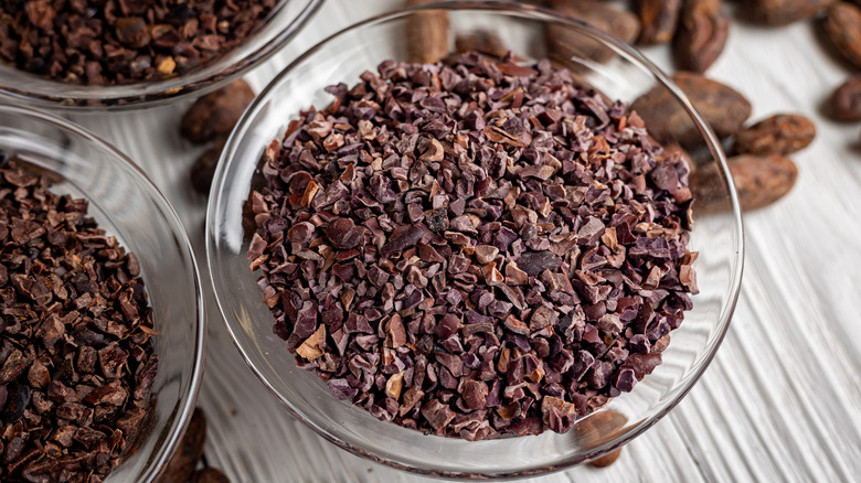 Cocoa nibs in clear bowl 