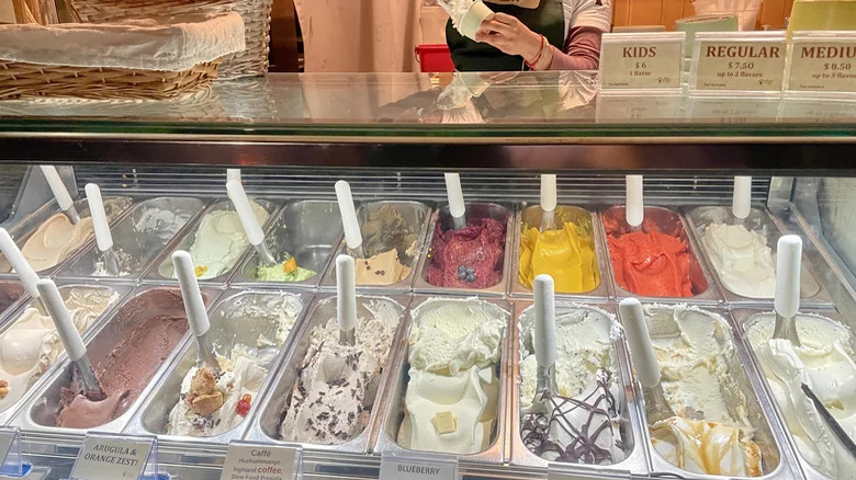 Various gelato flavors in pans