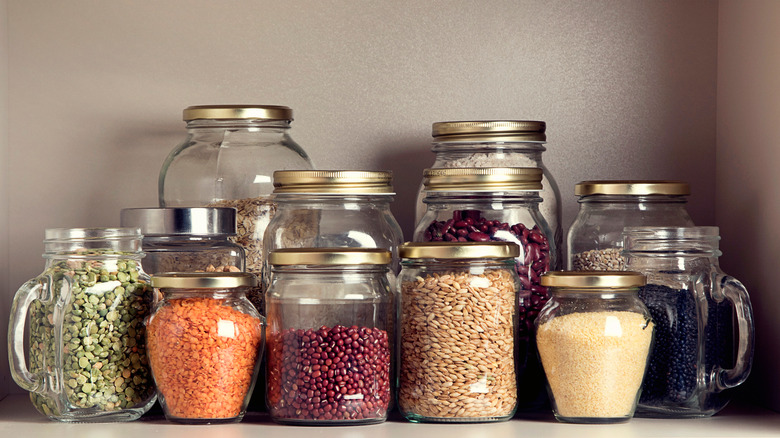 Dried beans lentils in glass jars