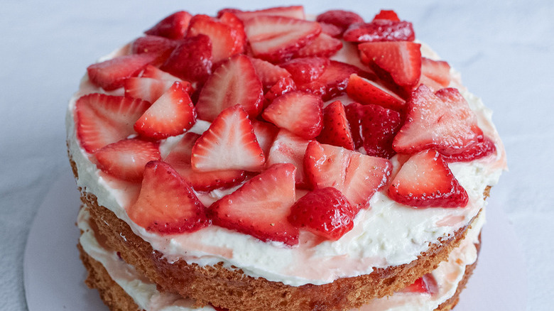 cake with strawberries on top