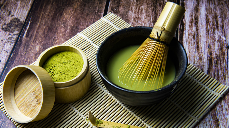 whisking matcha