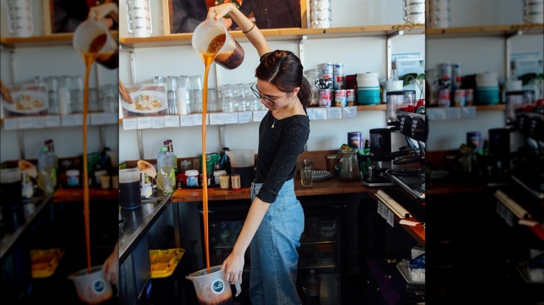 woman pouring tea