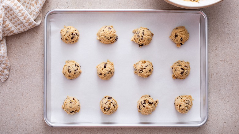 Cookie dough balls on pan