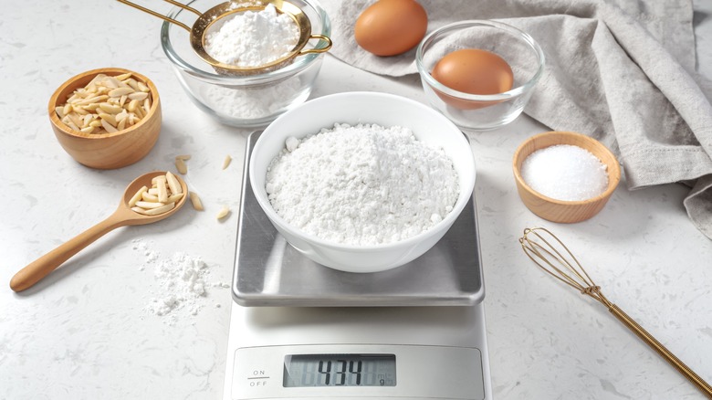 Baking ingredients with kitchen scale 