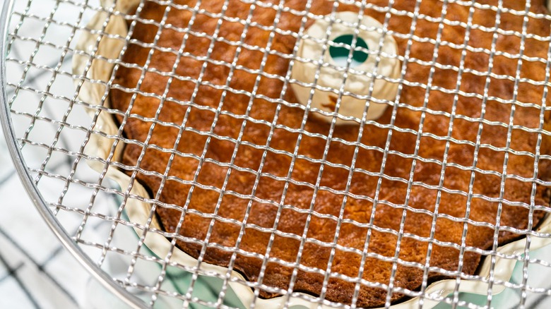 Bundt cake with a cooling rack