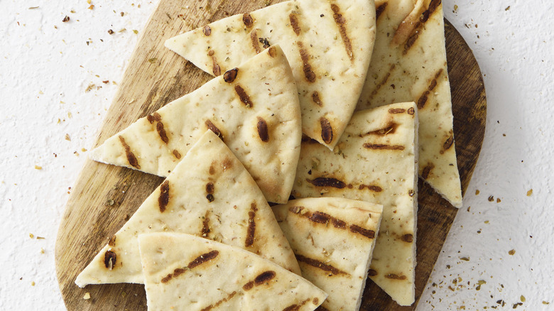 grilled pita on a board