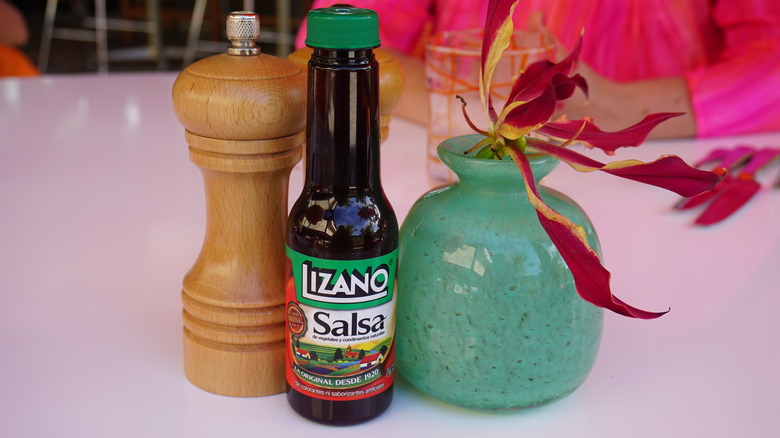 lizano salsa on table