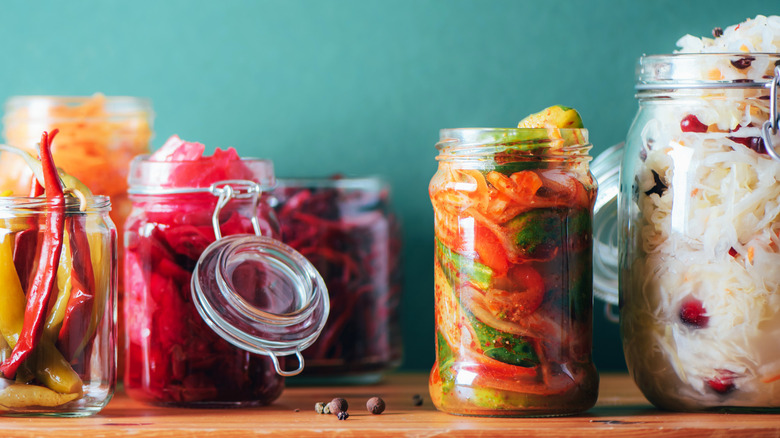 jars fermented chilies and vegetables