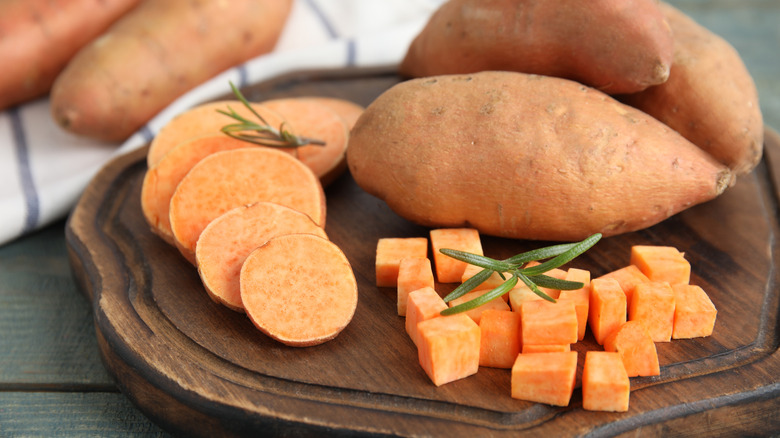 Sweet potatoes on cutting board
