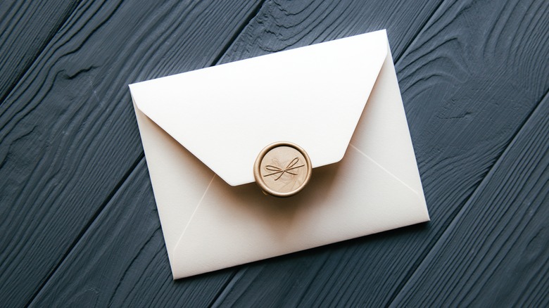 White envelope on blue background