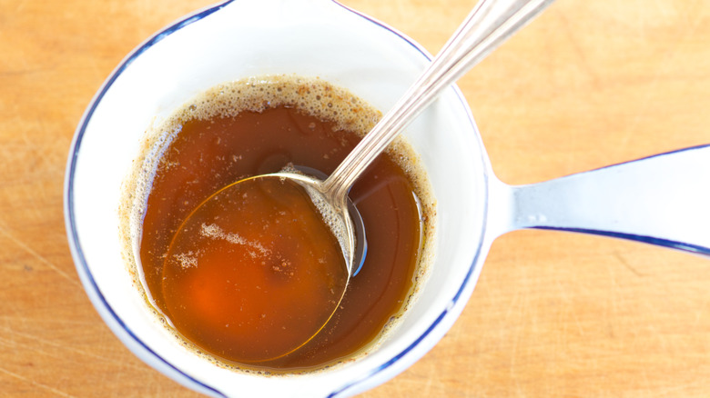 Browned butter with spoon