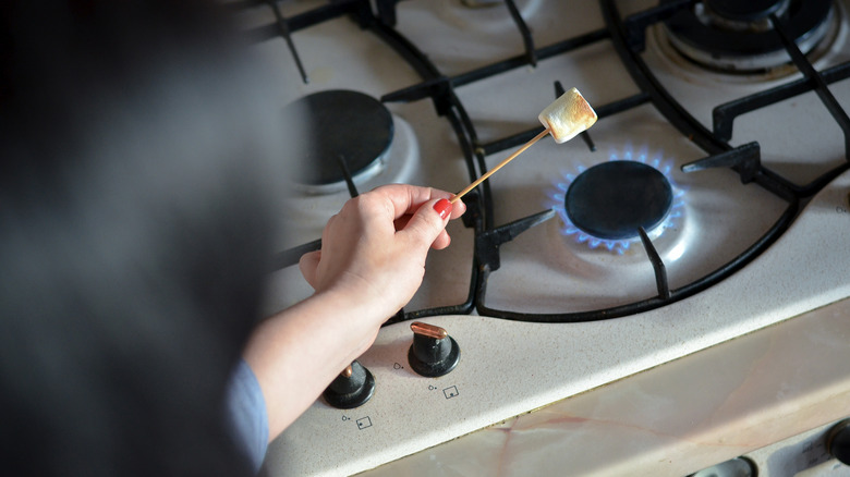 roasting marshmallow over stove