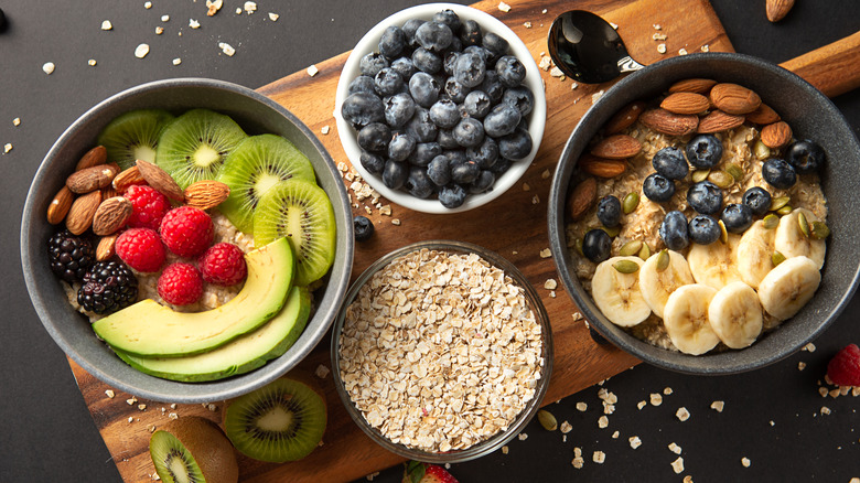 bowls of oats, fruits, and nuts