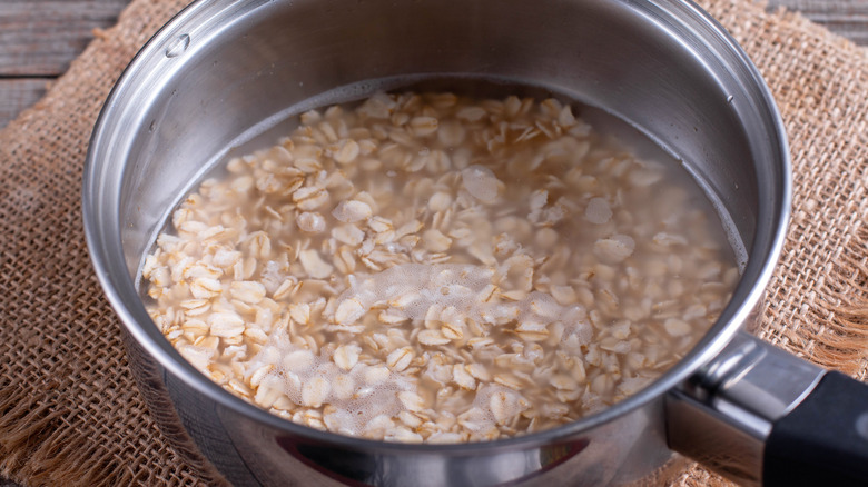 oats and water in saucepan